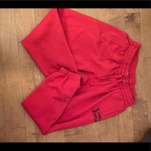 Red Kids joggers/sweatpants. Written ‘limited edition’